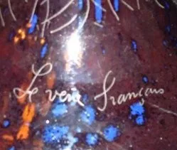 antique glass signed Charder, featuring vibrant colors.