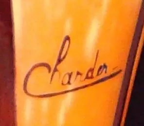 Verre avec signature de Charder dans un cadre ancien.