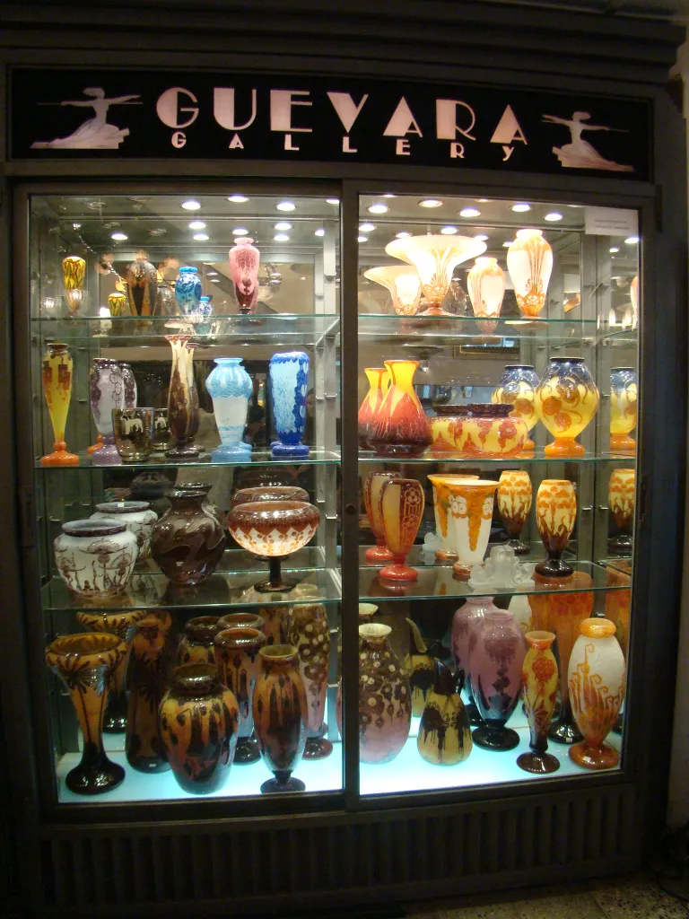 Showcase of antique signed glass by Charder.