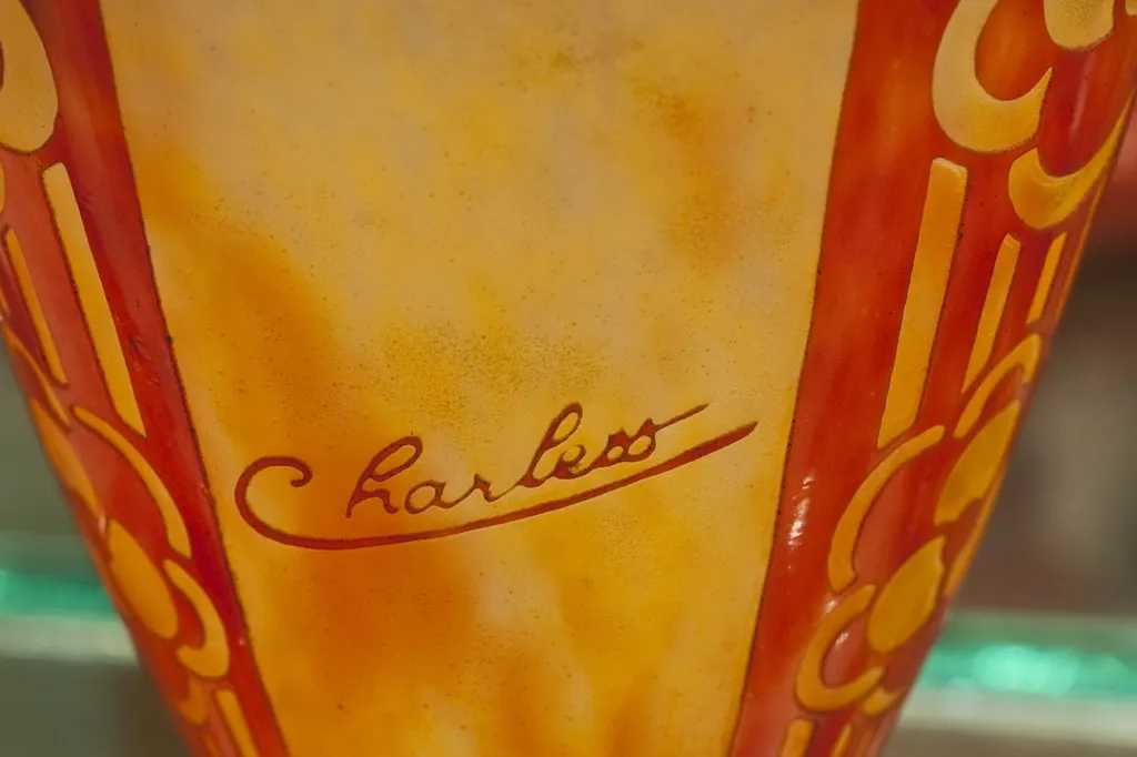 Antique signed glass Charder, featuring warm colors and elegant design.