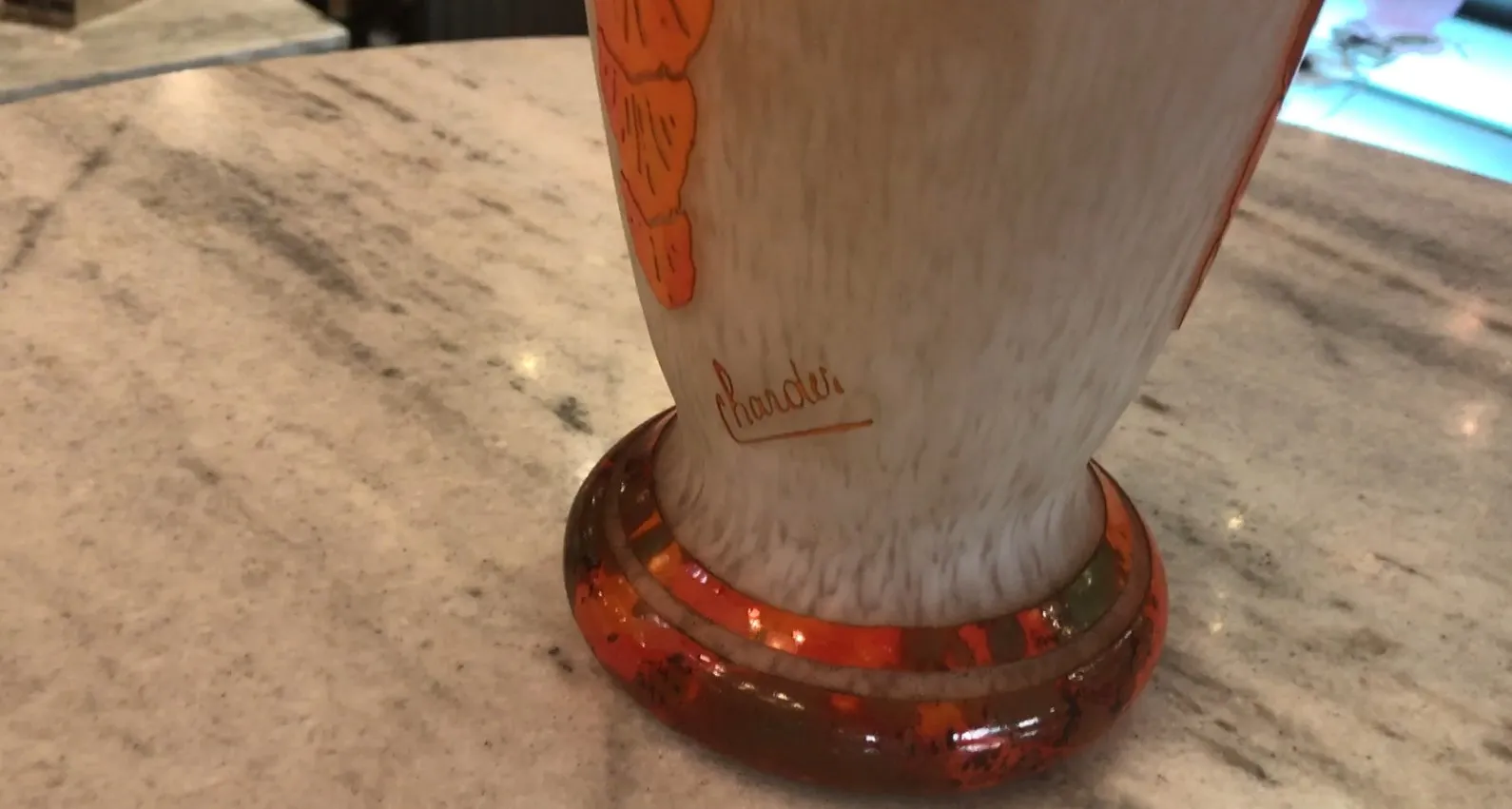 Decorative signed glass by Charder in an elegant setting