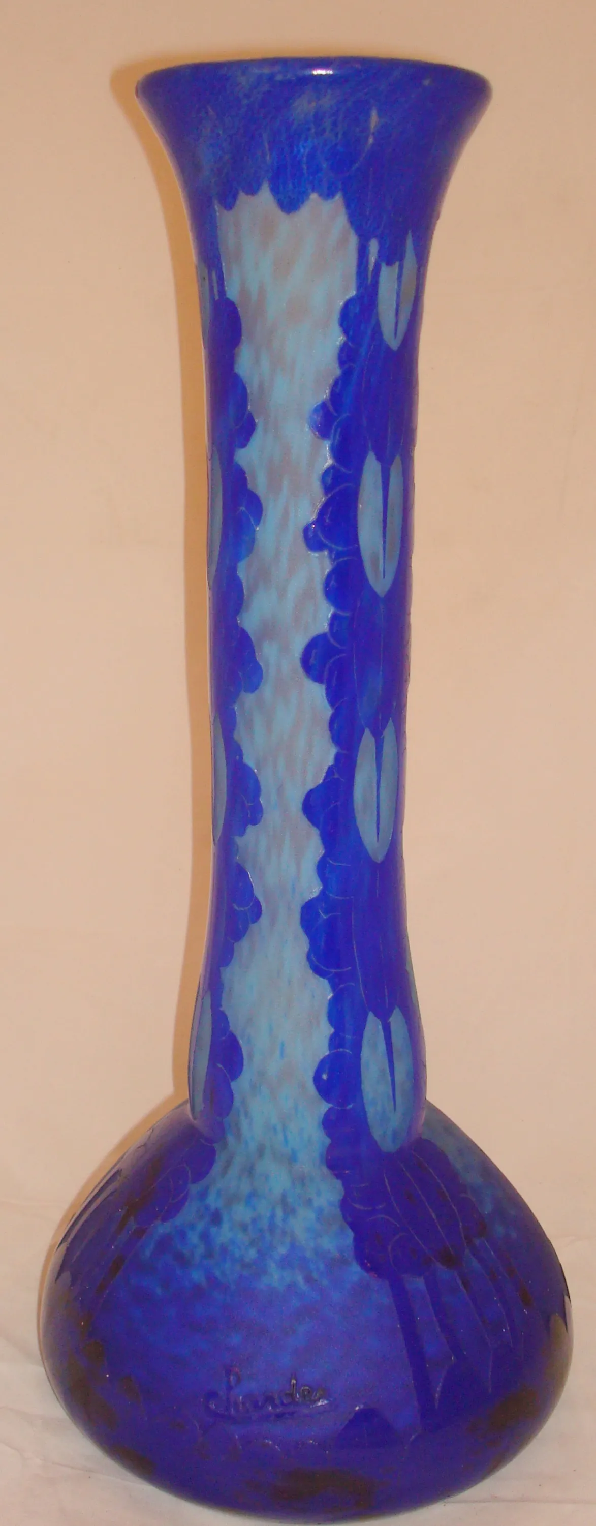 Tall blue vase signed by Charder, elegant and distinct.