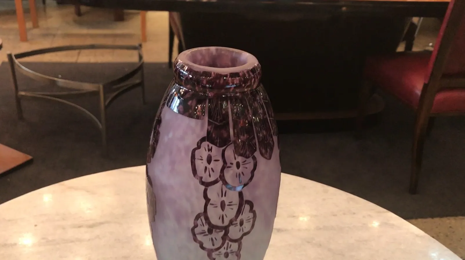 Antique signed glass by Charder with floral decoration on light background