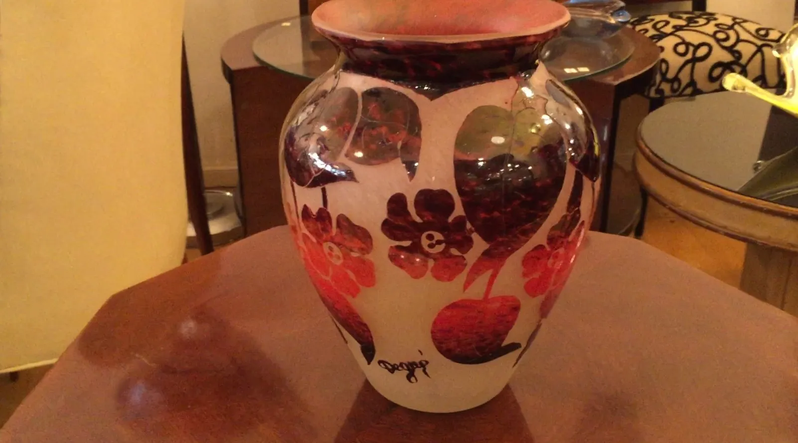 Antique Degué vase with vibrant floral decorations.