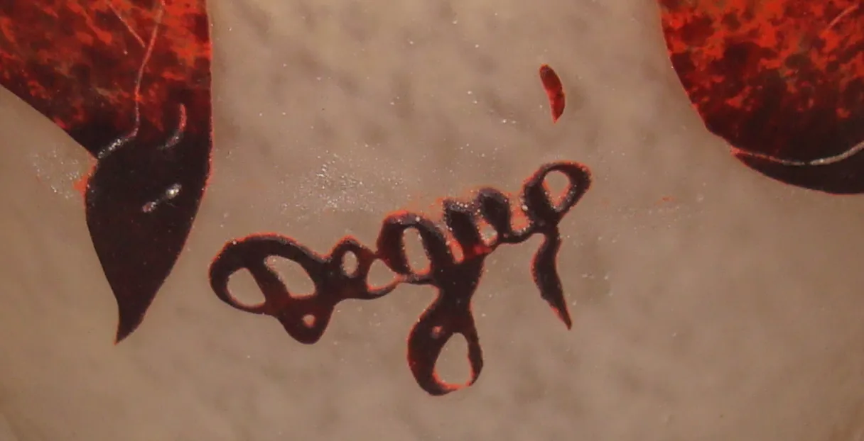 Antique signed glass Degué with artistic details.