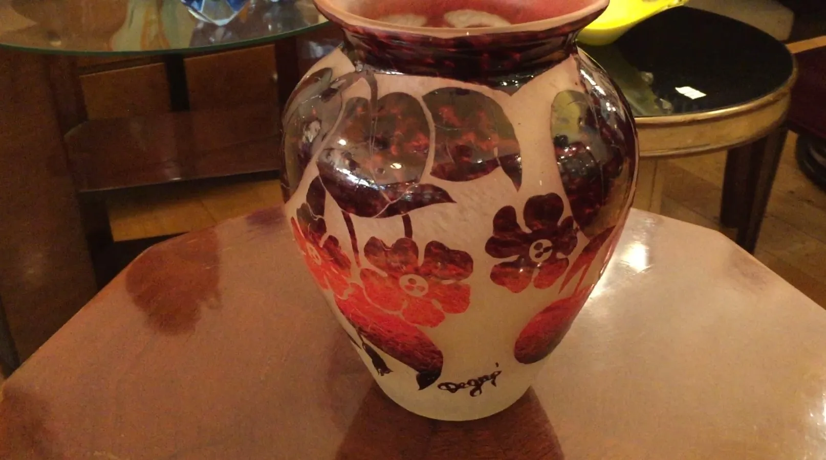 Antique vase signed with red flowers and glass details.