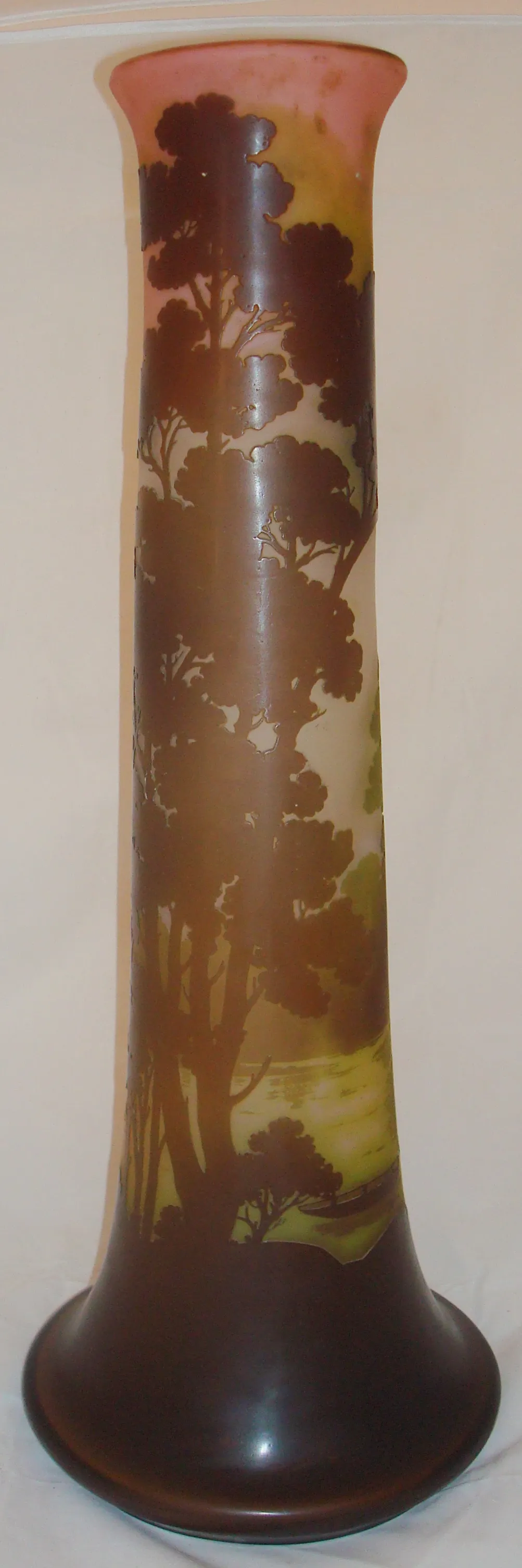 Antique signed glass Gallé featuring a nature scene.