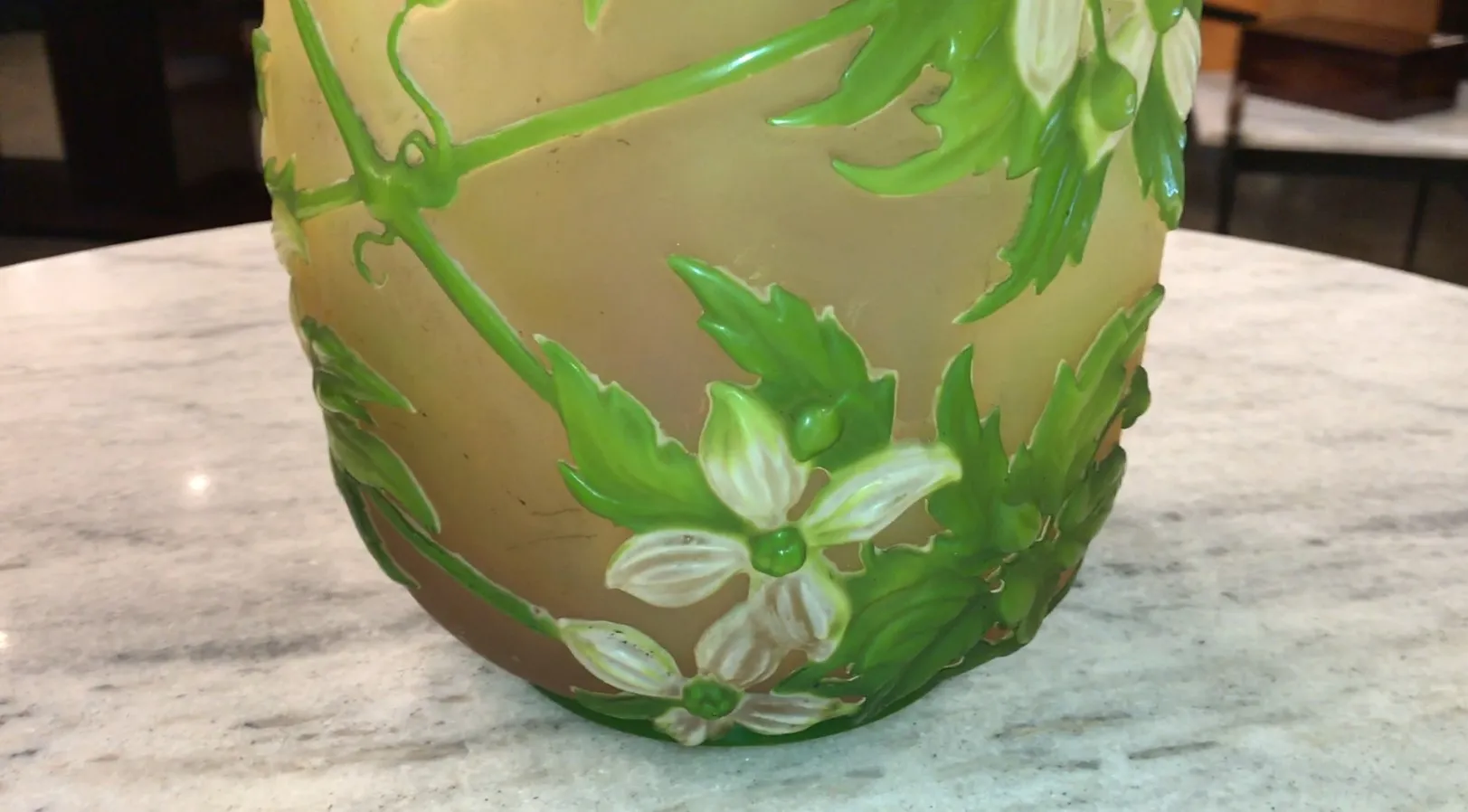 signed glass with green and white flowers, antiques