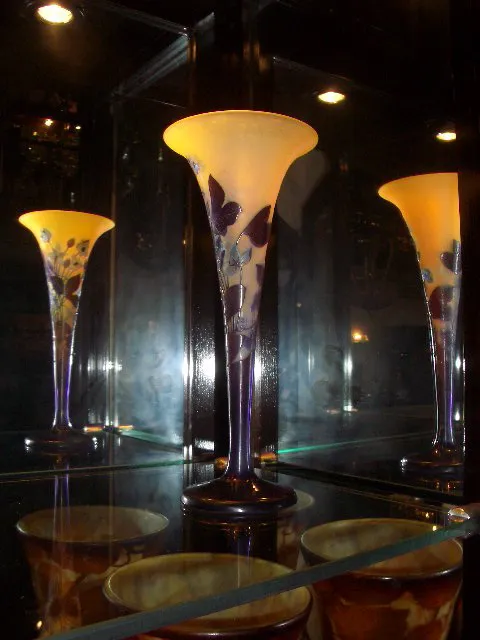 antique vase with butterfly decorations and soft colors