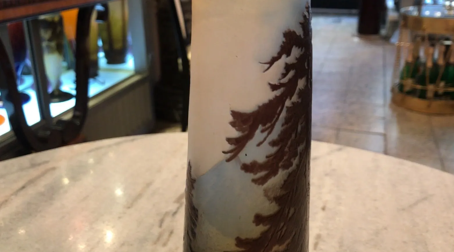 Antique signed glass Gallé featuring landscape details in neutral colors