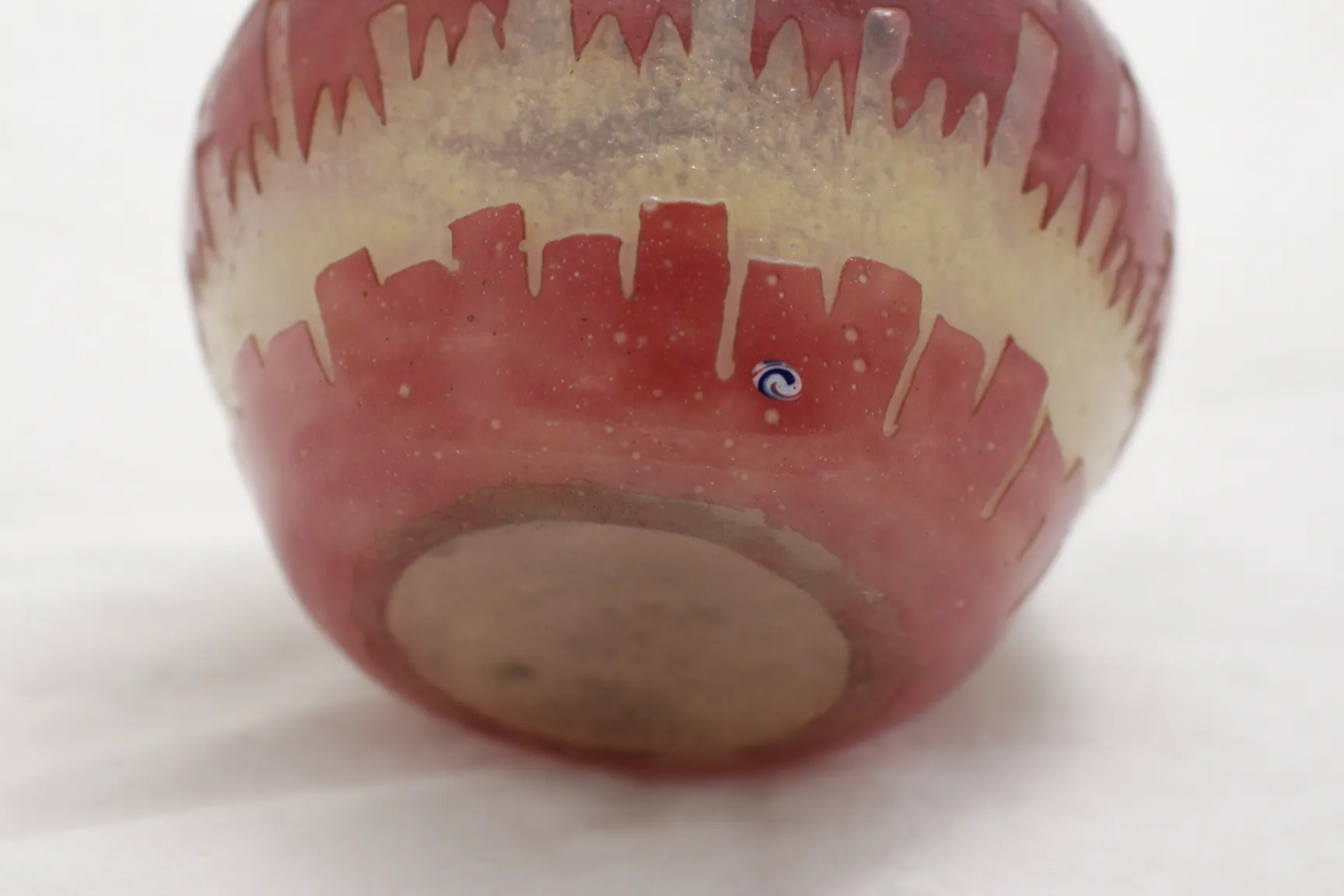 antique glass in red and gold design with visible signature