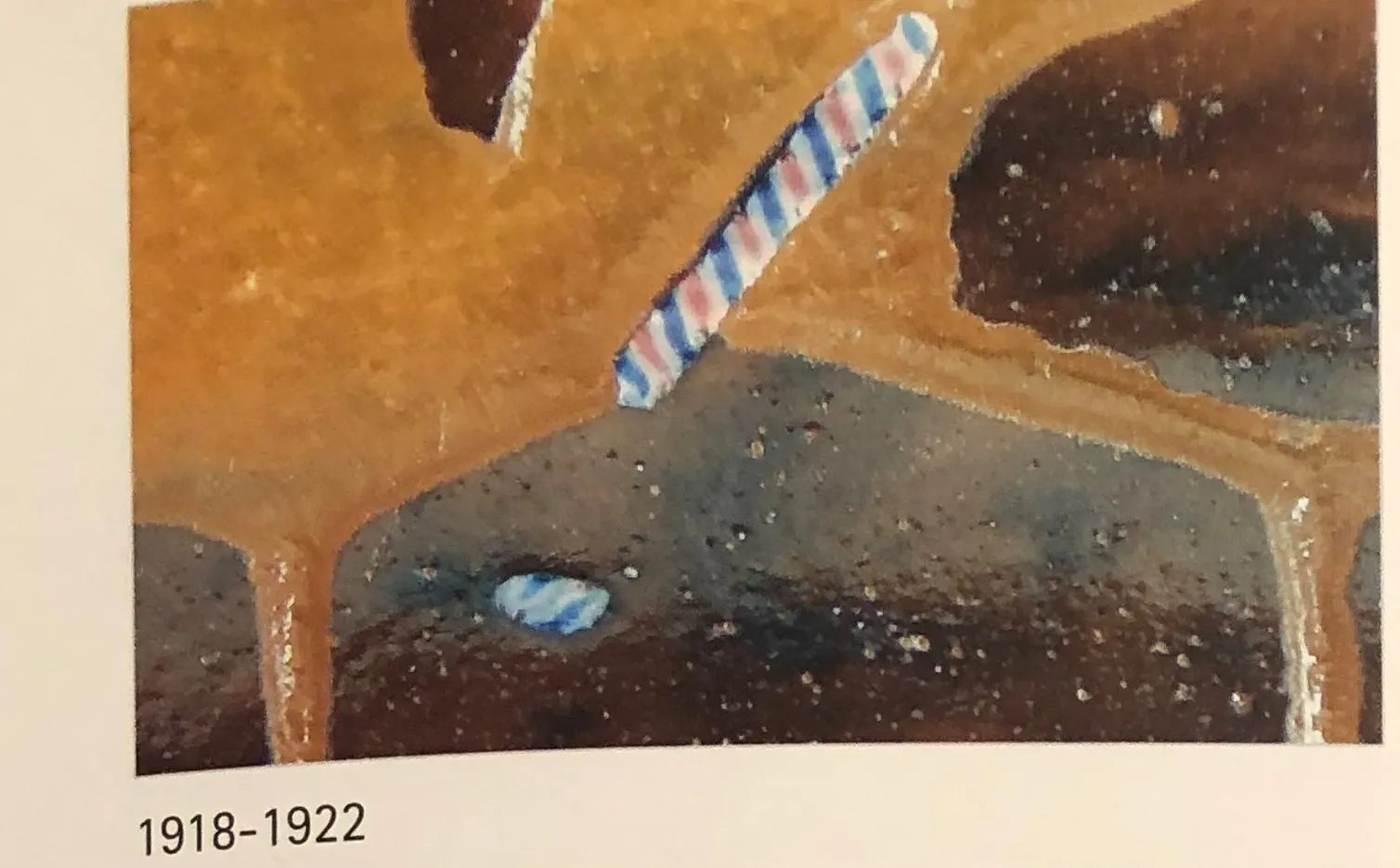 antique glass with signature in blue and red colors