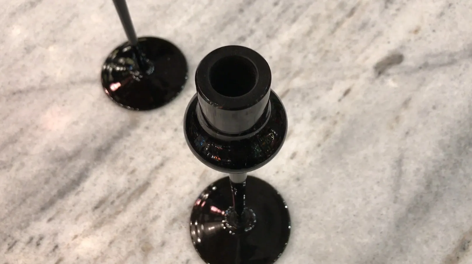 Antique signed glass with sleek black base design