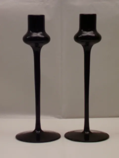 Antique signed glass candlesticks, elegantly shaped bases.