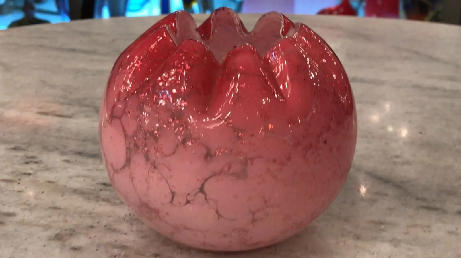 Antique signed glass with vibrant colors and unique shapes.