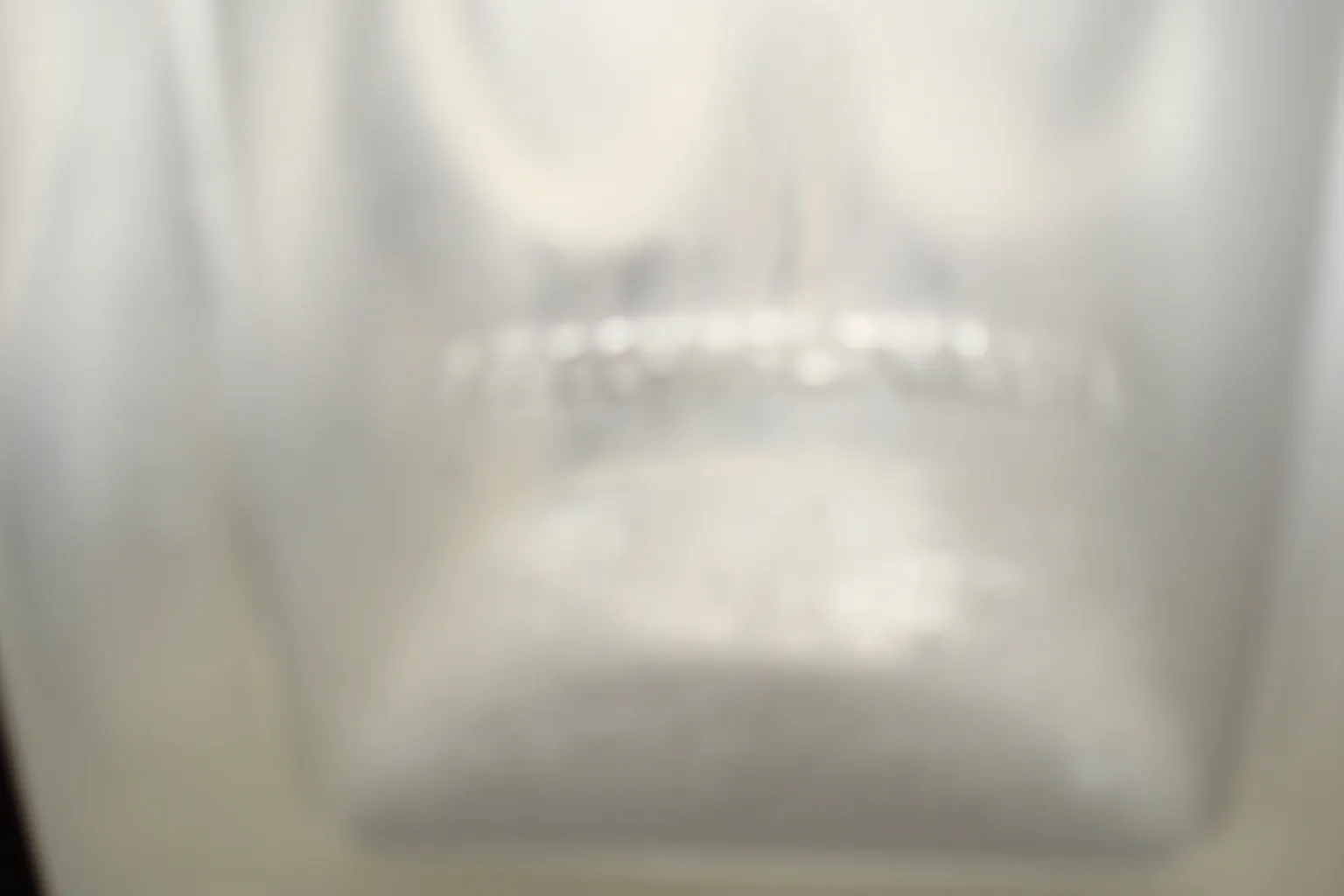 Signed glass with visible antique details