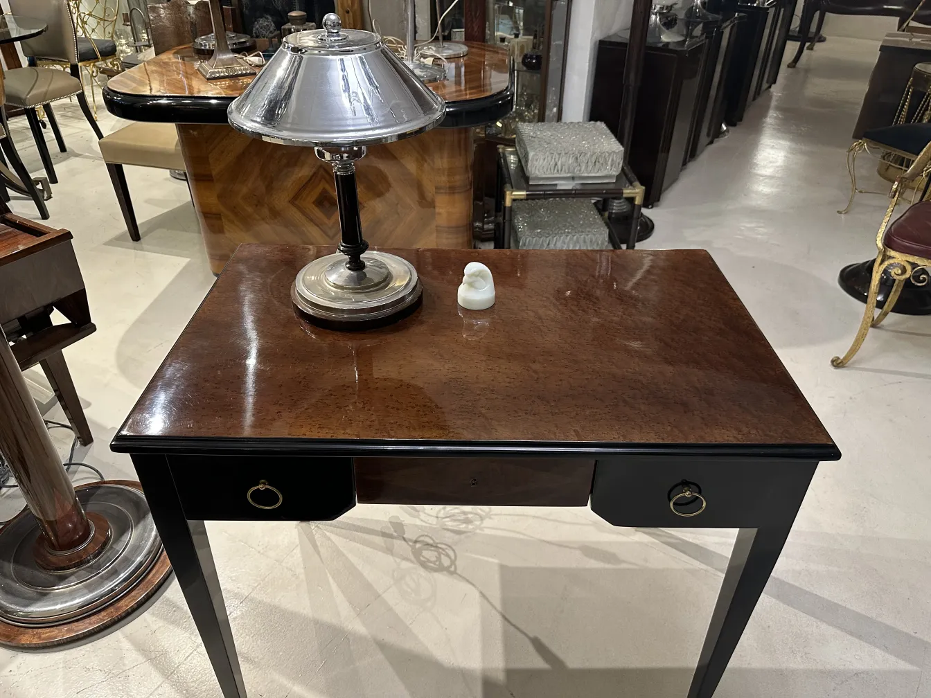 antique with signed glass on a light wooden table