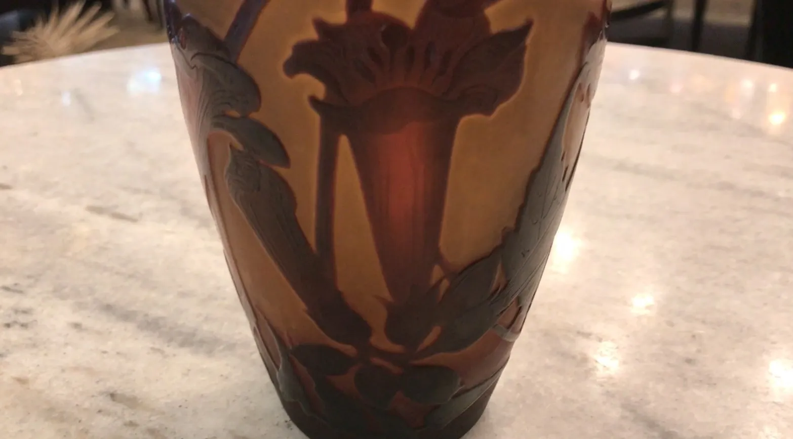 antique glass vase with floral design and signature
