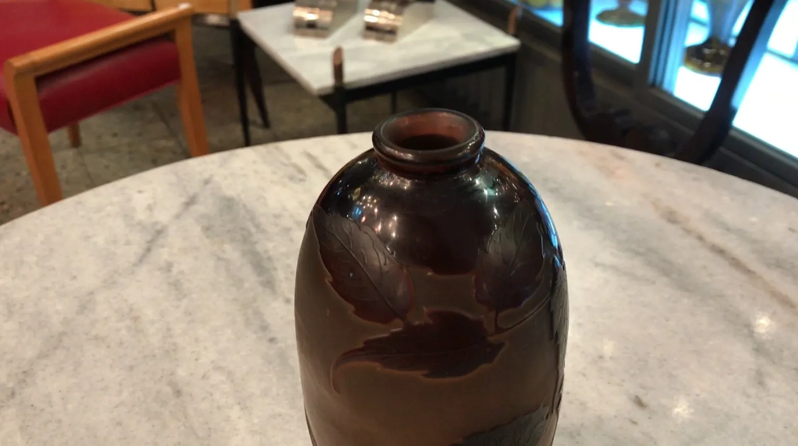 dark decorative glass with carved details and elegant shape