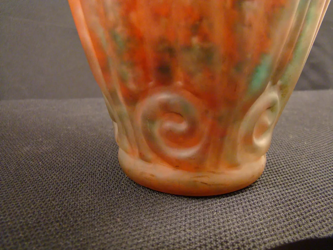 detail of an antique glass with signature and decorations
