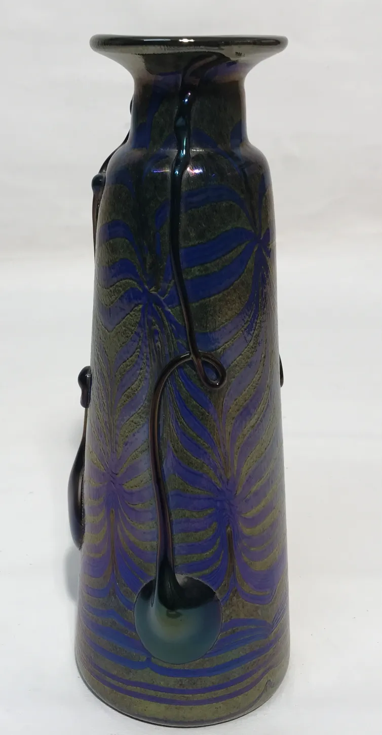 Vase of signed glass Loetz with green and blue leaf decoration.