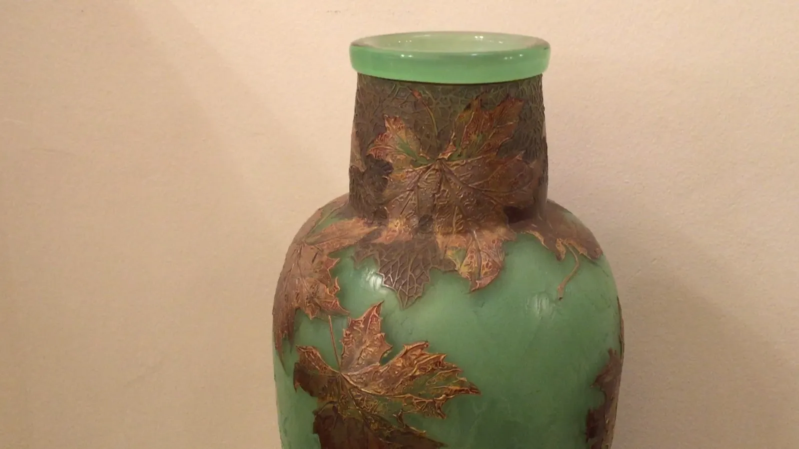 antique vase with leaf design in relief