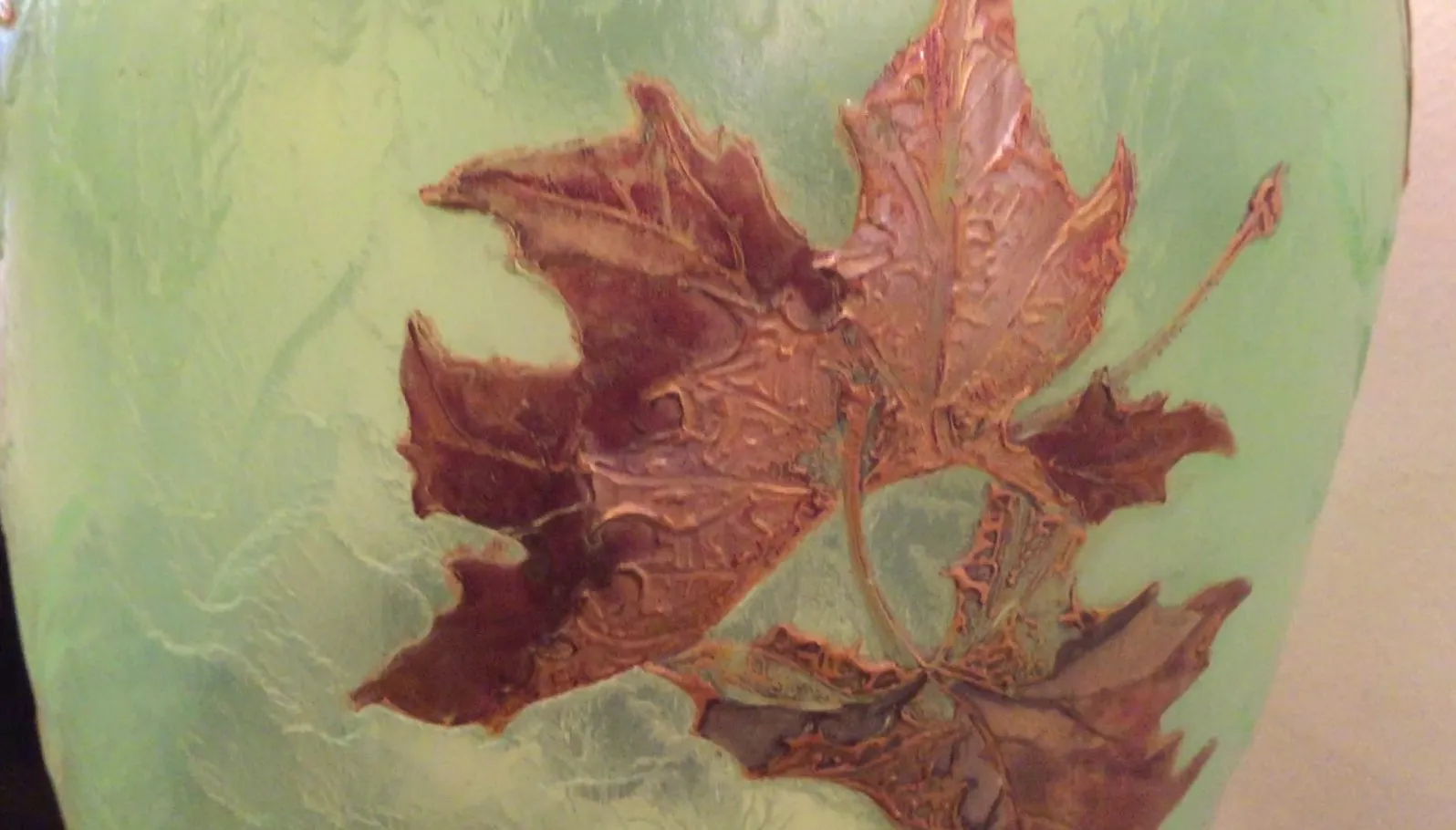 Antique signed glass LEGRAS featuring leaf designs.