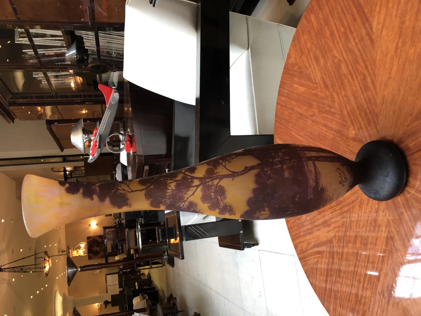 Antique vase with warm landscape design