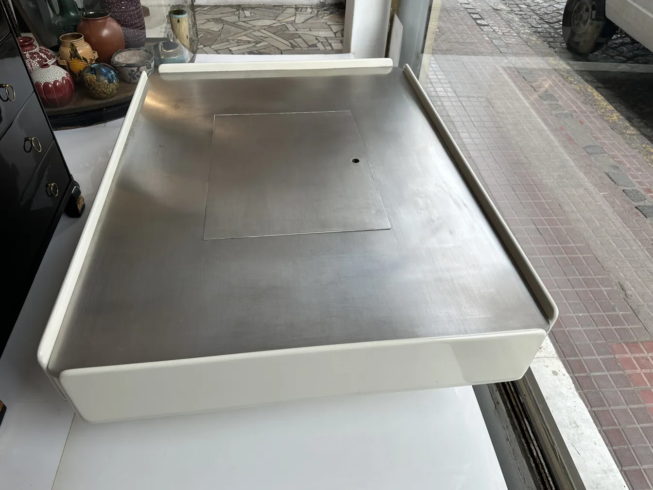 antique coffee table with smooth surface and visible details