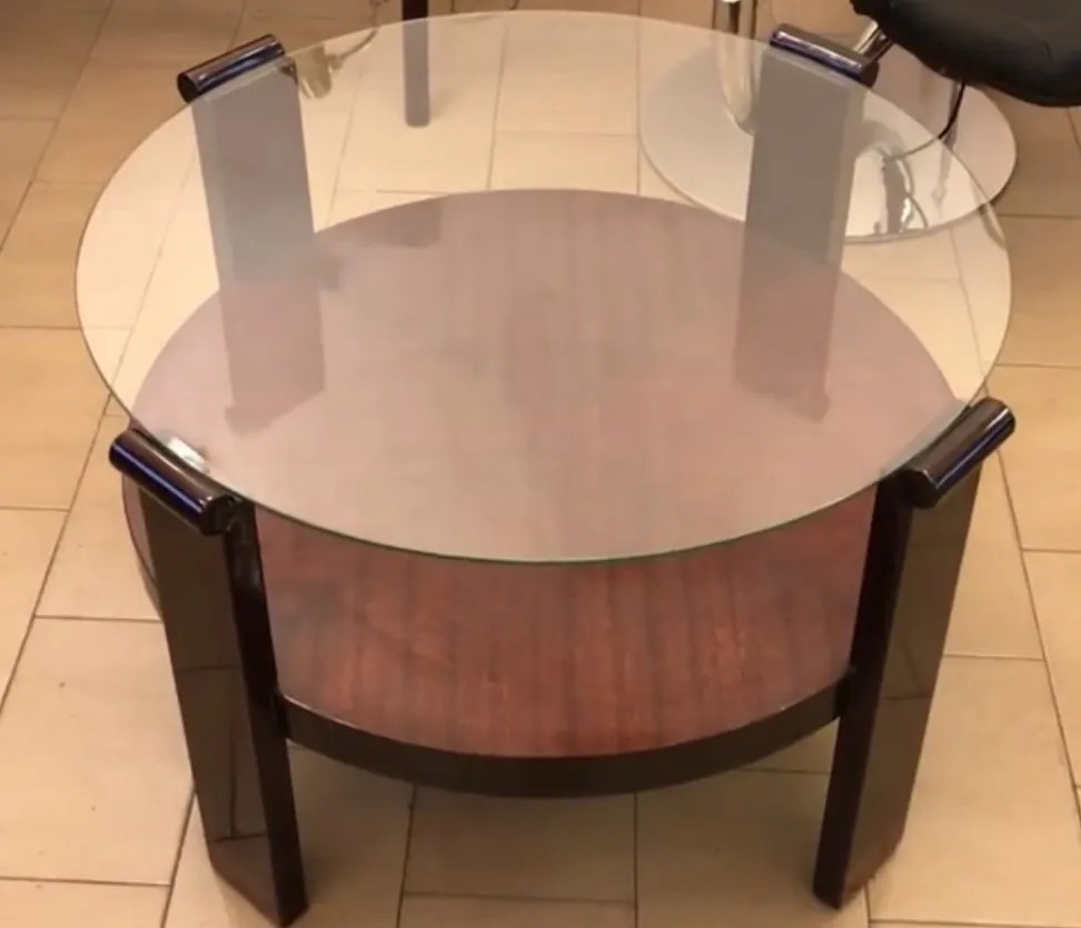 antique round coffee table with glass top, elegant design