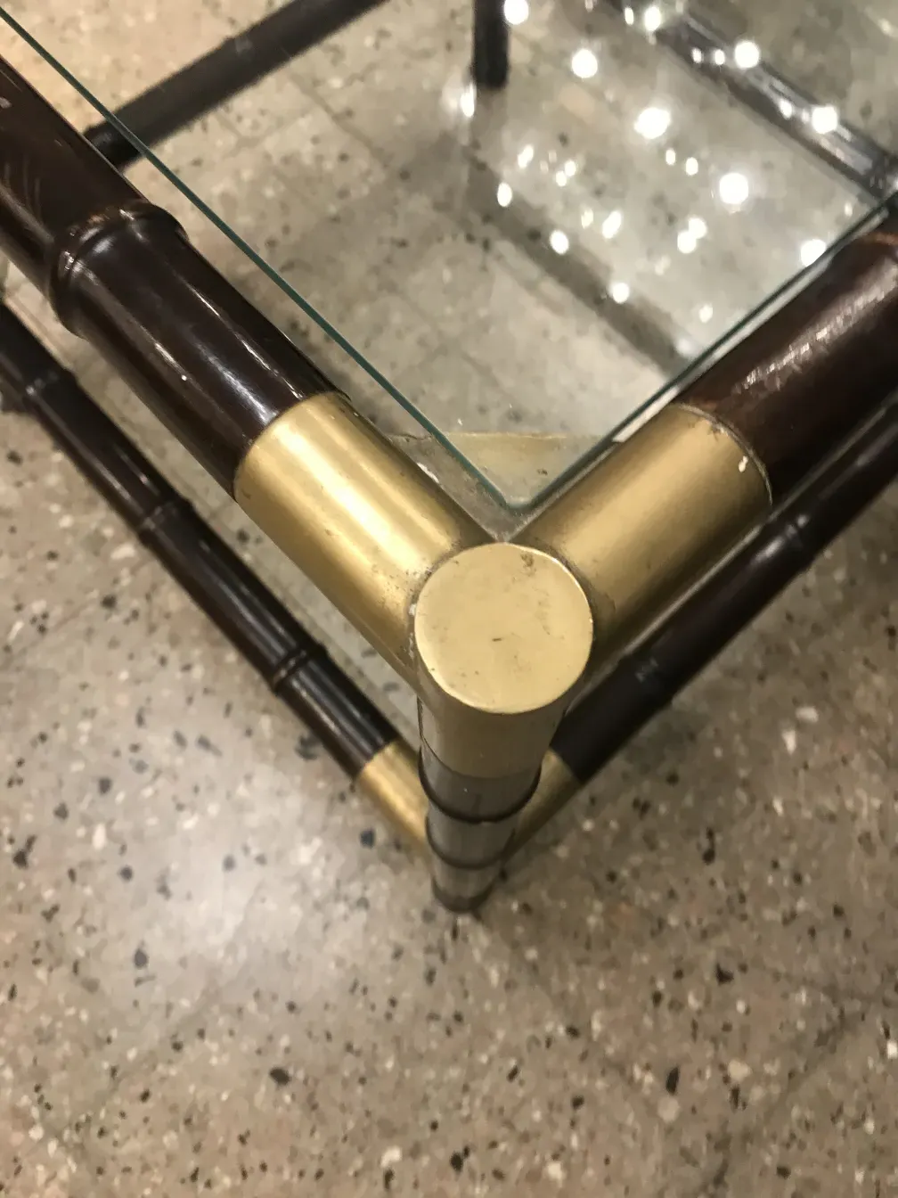 Antique coffee table with elegant design in a modern setting.