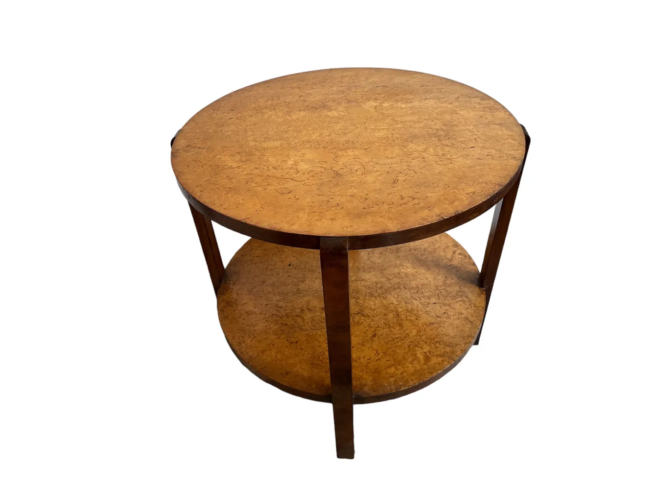 petite table antique ronde avec deux niveaux dans un environnement simple