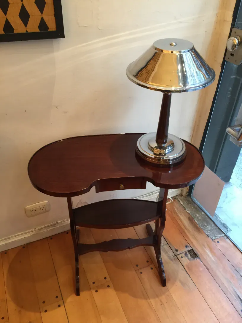 antique small round table with lamp and warm atmosphere