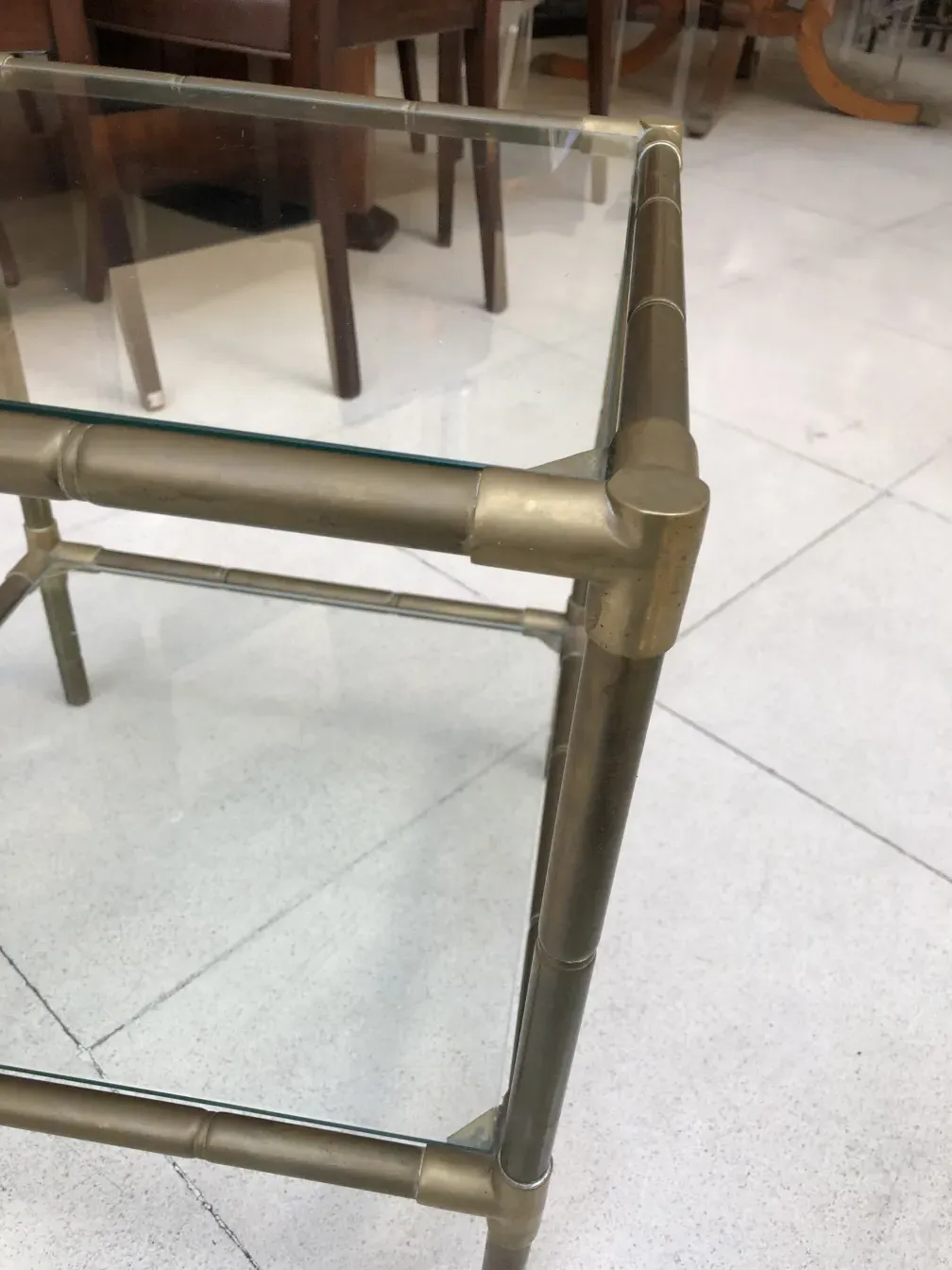 Antique small table with glass top, great for decoration.