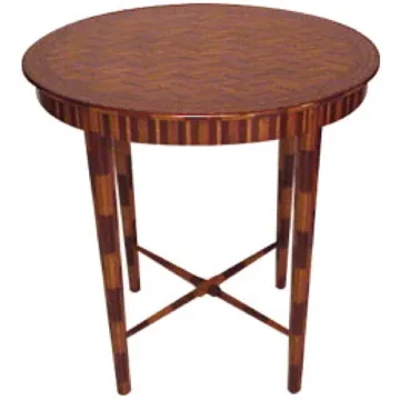 ancienne table ronde avec un design attrayant et des pieds décoratifs