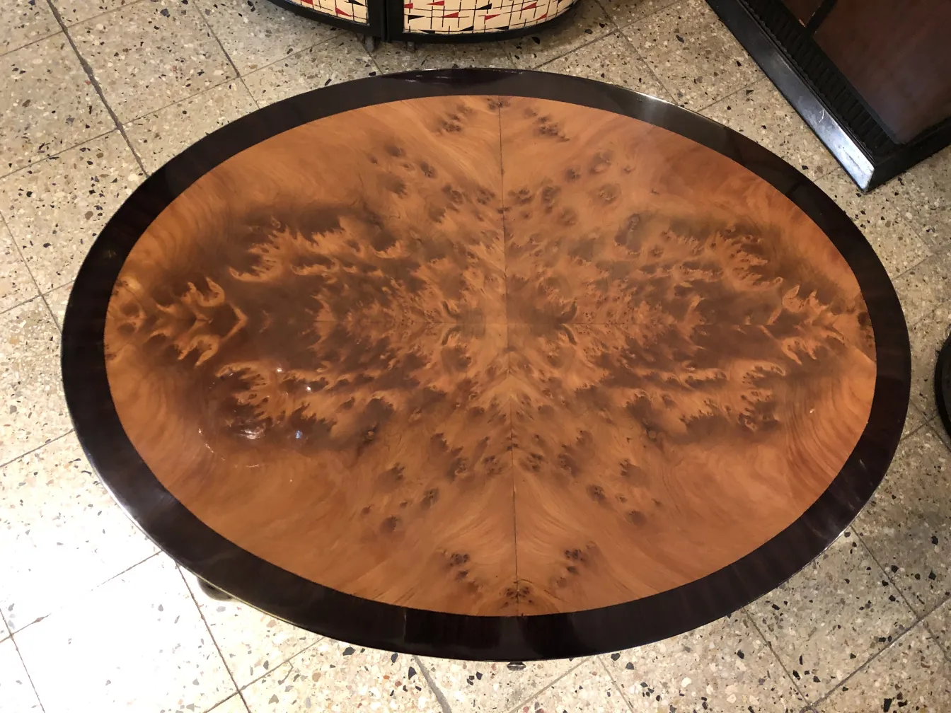 antique round small table with surface design in a classic setting