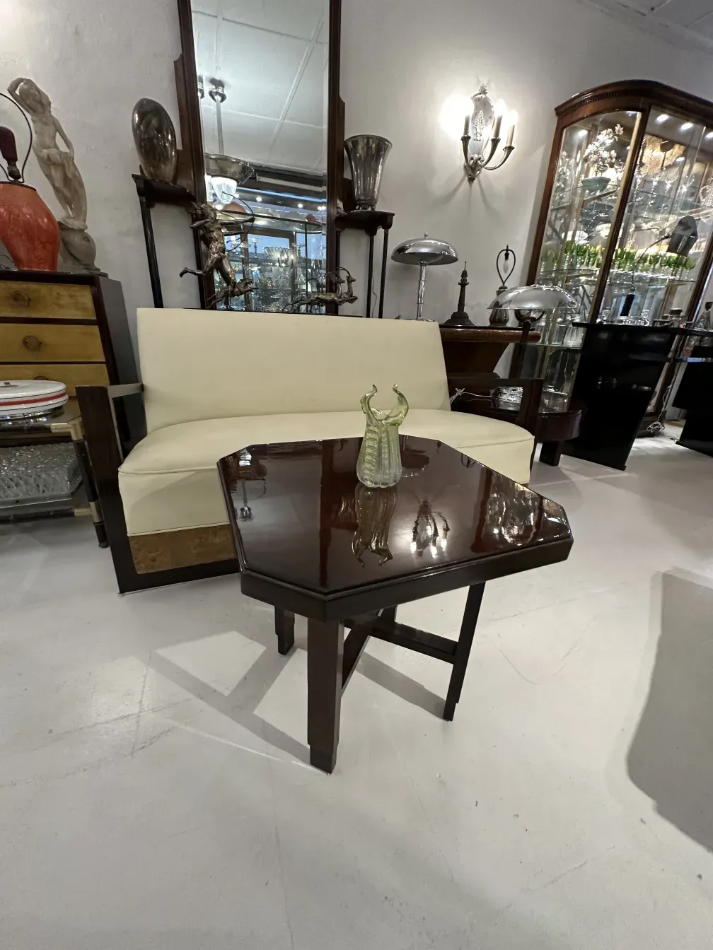 Antique small table with elegant decoration in a classic setting.