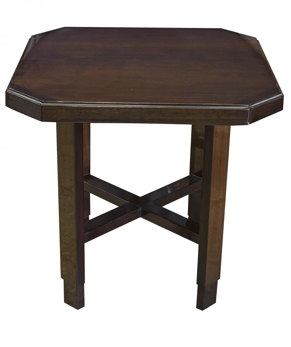 antique small table with octagonal shapes in a classic setting