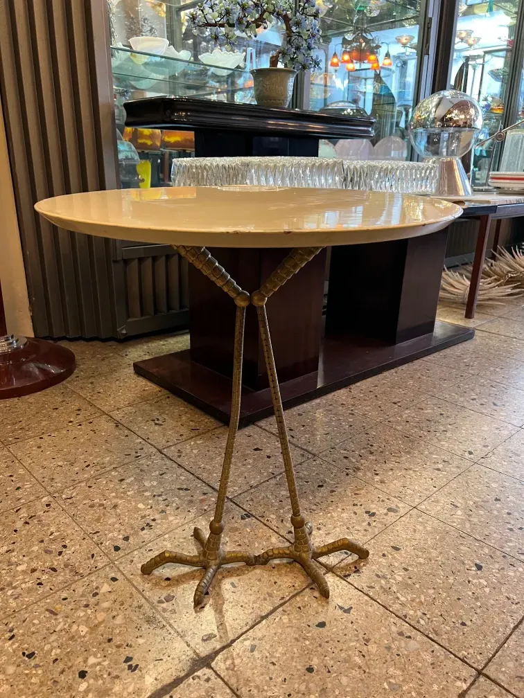 Set of 2 antique small tables in an elegant environment