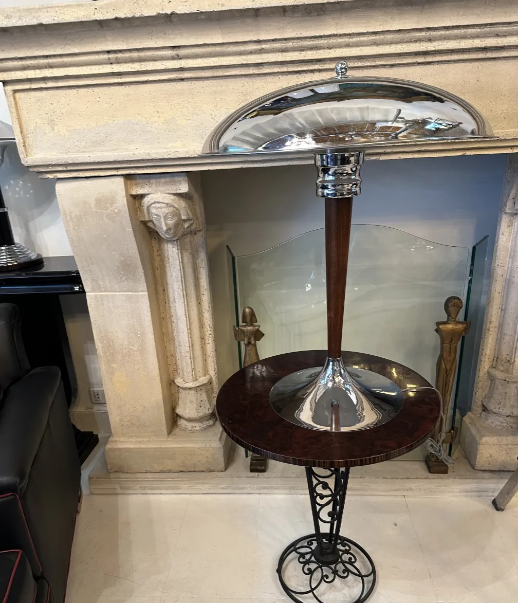 Two antique small tables with elegant design and decorative details.