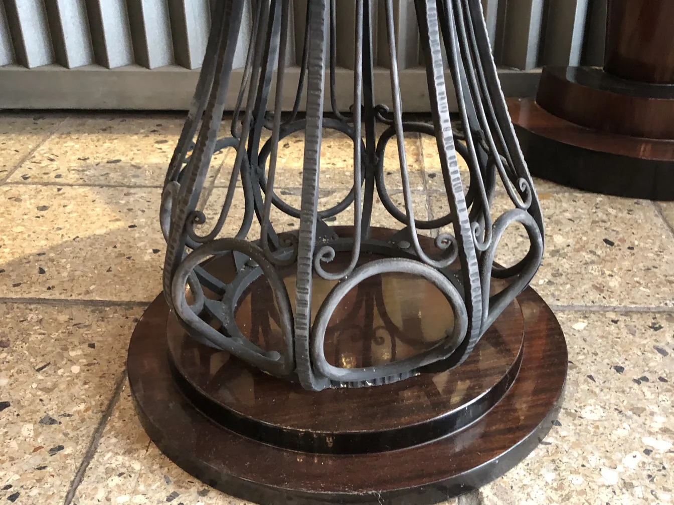 2 small antique tables with decorative design in a cozy environment