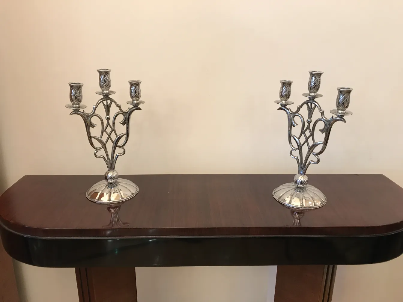 pair of antique candelabras art nouveau on an elegant table