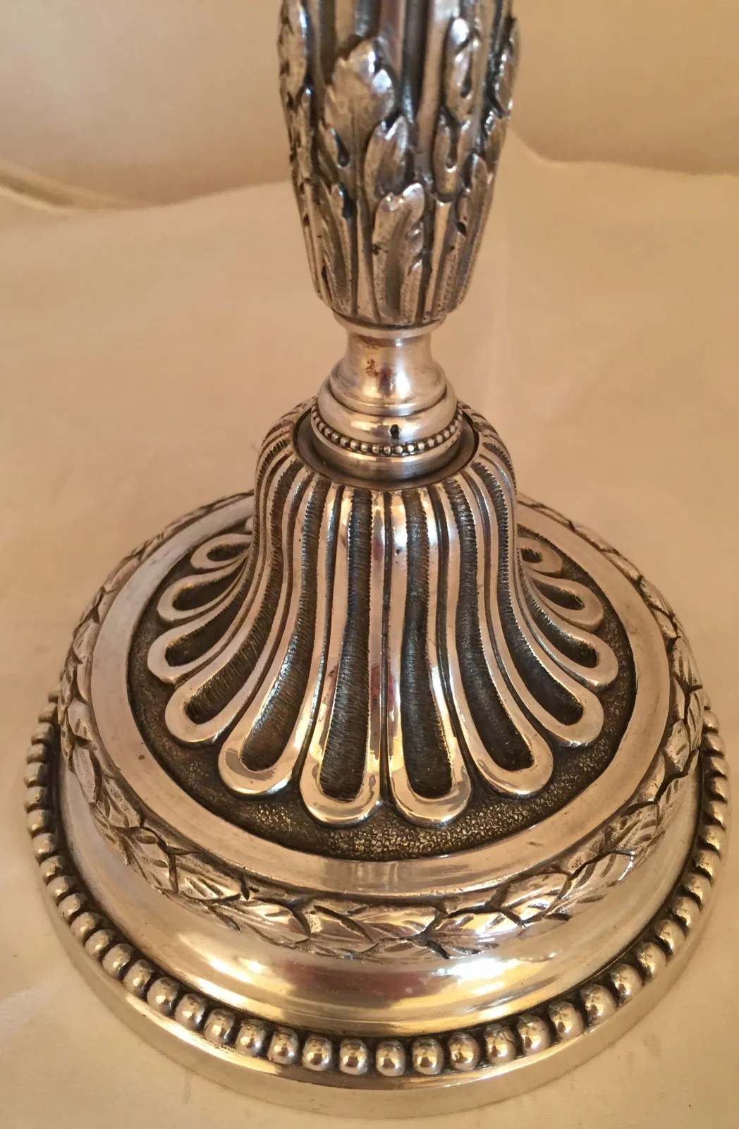 2 antique candelabras with decorative base design