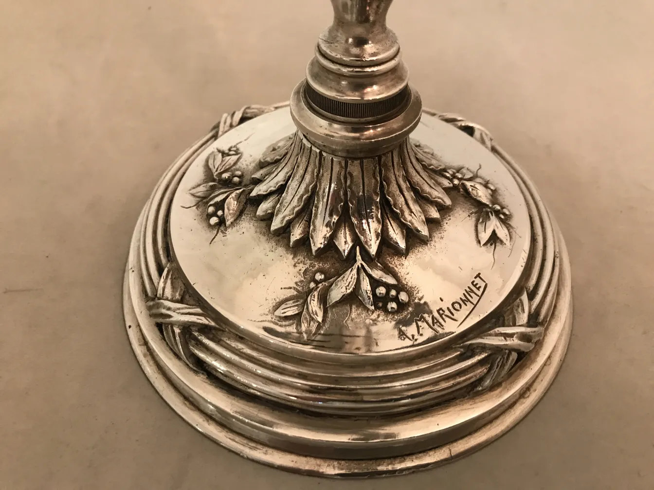 Decorative base of two antique candlesticks art nouveau with floral details