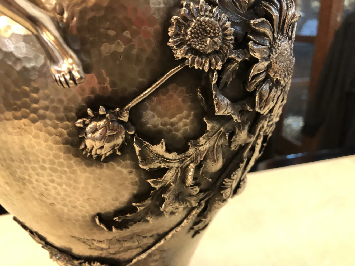 antique vases decorated with flowers and leaves