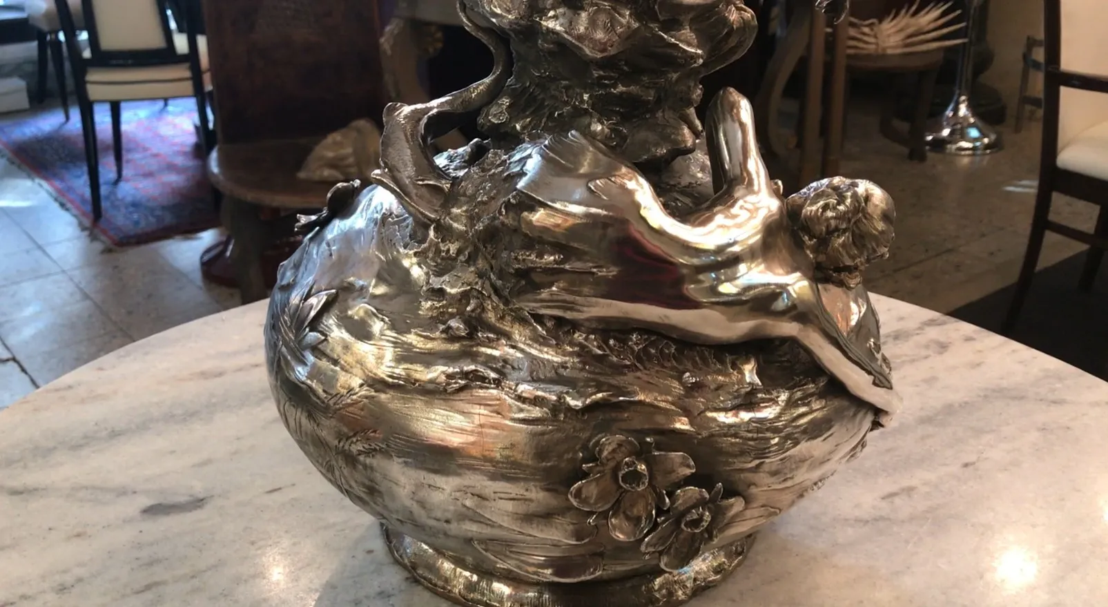 Antique vases with Art Nouveau design, decorated with flowers and figures