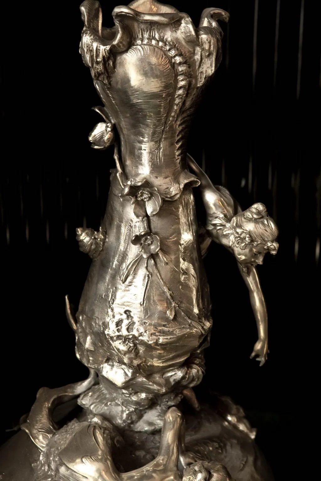 Detailed view of 2 antique art nouveau vases with unique decorative details