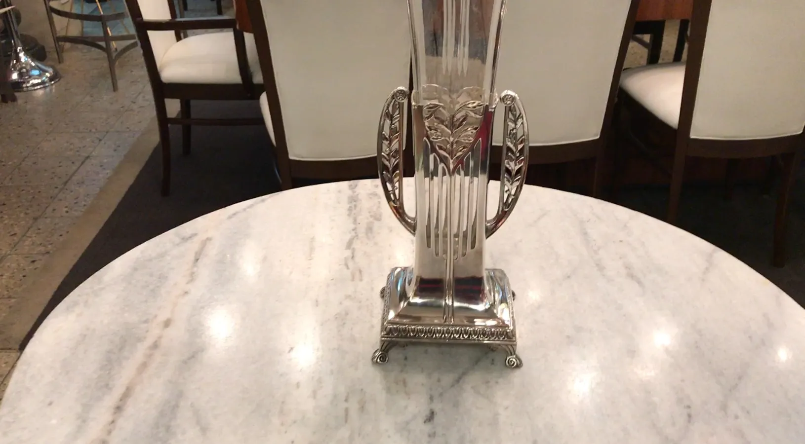 Antique vases with intricate details in the setting