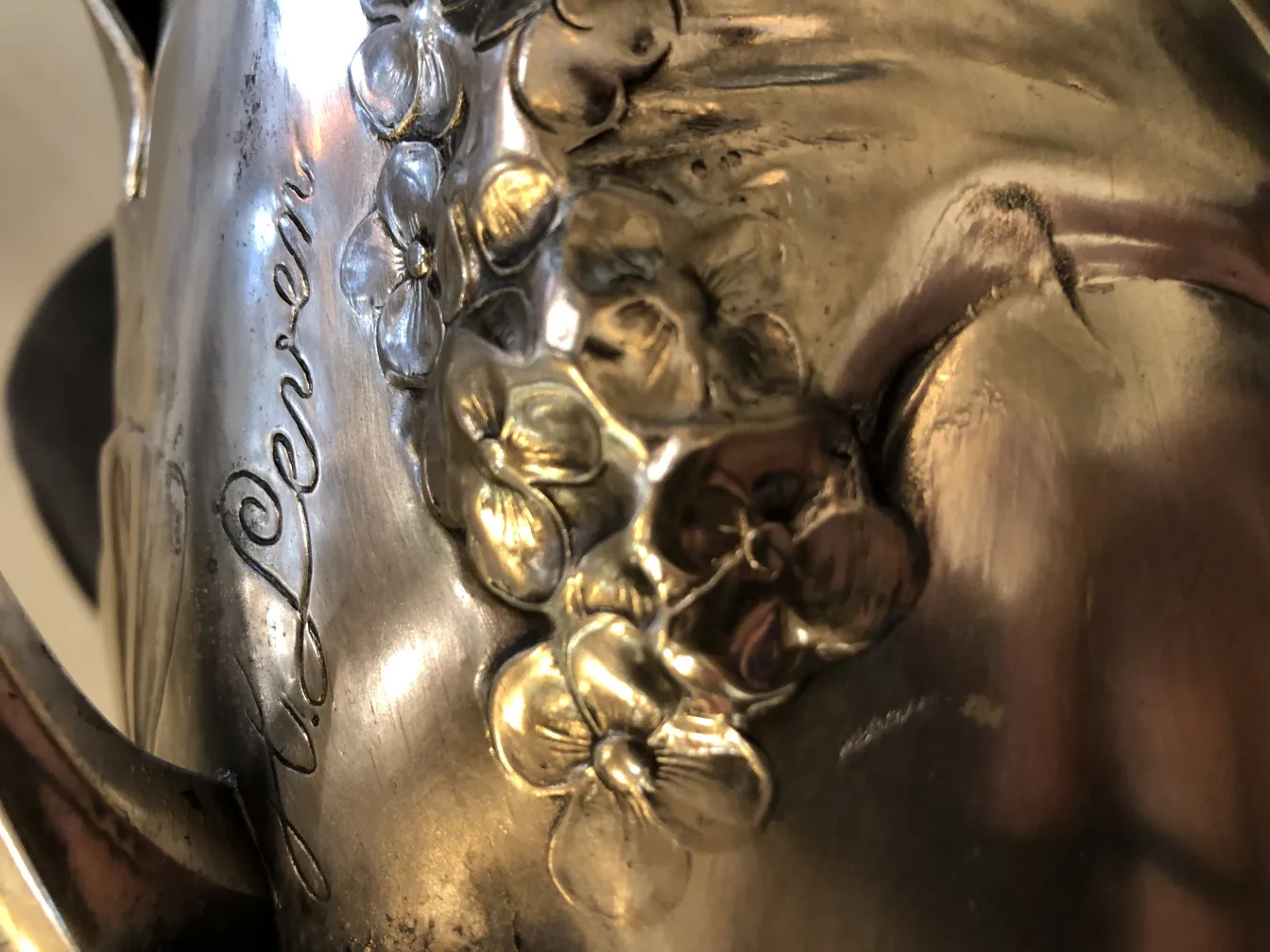 antique vase showcasing floral details and fine engravings