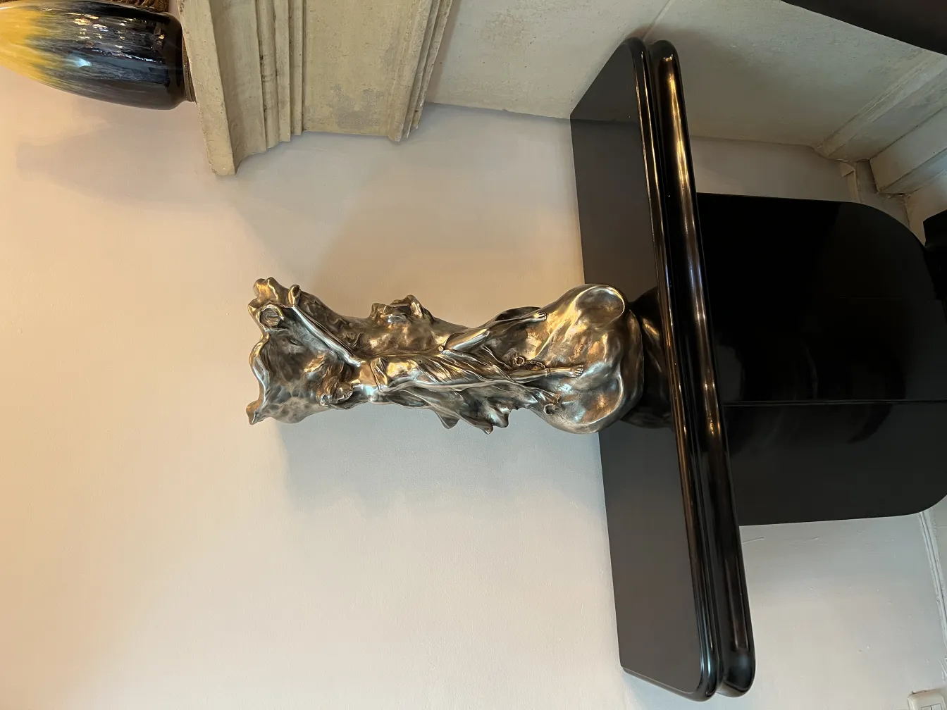 Antique vase with sculptural art nouveau design in elegant setting